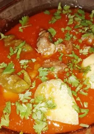 A picture of Aloo chicken salan.