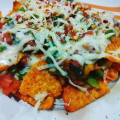 A picture of Cheesy nachos.