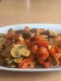 Champis rehogados con tomate