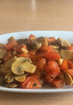 Una foto de Champis rehogados con tomate