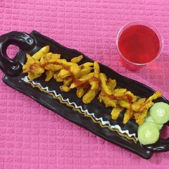 A picture of French fries in besan & sabudana flour.