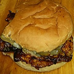 A picture of Tex's Chinese BBQ Grilled Pork Cheesesteak 🐷🍞🧀🍲.