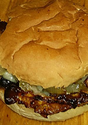 A picture of Tex's Chinese BBQ Grilled Pork Cheesesteak 🐷🍞🧀🍲.