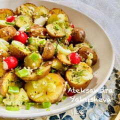 A picture of Potato salad with radish and garlic honey dressing.