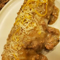 A picture of Smothered Green Chile Steak burritos.