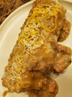A picture of Smothered Green Chile Steak burritos.