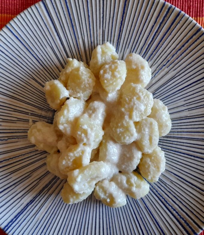 Foto principal de Gnocchi de patata con salsa de queso