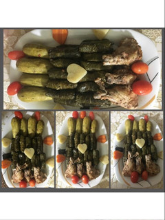 A picture of Stuffed Zucchini and Grape Leaves with Chicken Wings.