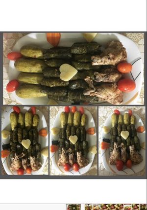 A picture of Stuffed Zucchini and Grape Leaves with Chicken Wings.