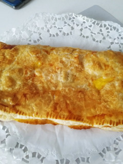 Una foto de Hojaldre relleno de manzana caramelizada