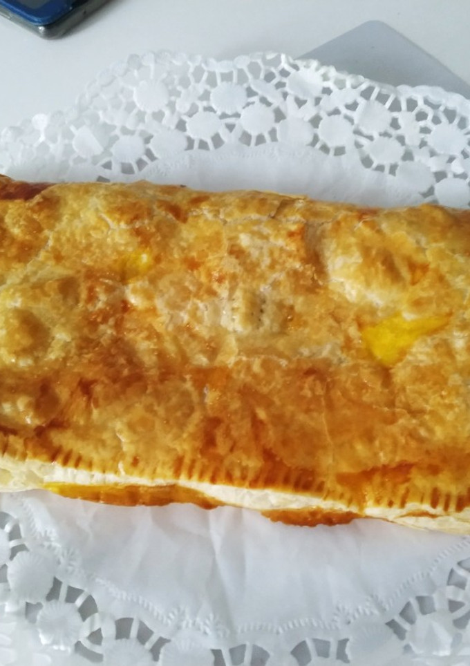 Una foto de Hojaldre relleno de manzana caramelizada