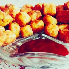 A picture of Chilli cheese potato bits.