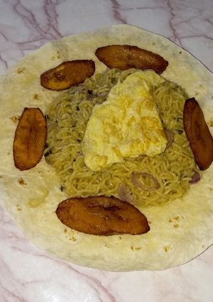A picture of Tortilla bedded Noodles.