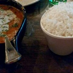 A picture of Rice and fry daal.