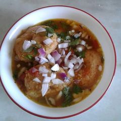 A picture of Sambar vada.