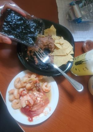 A picture of Cocktail shrimps with beans.