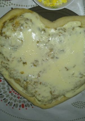 Una foto de Pizza corazón para amores golosos