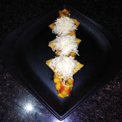 A picture of Raw Mango Nachos with Ripe Mango Salsa.
