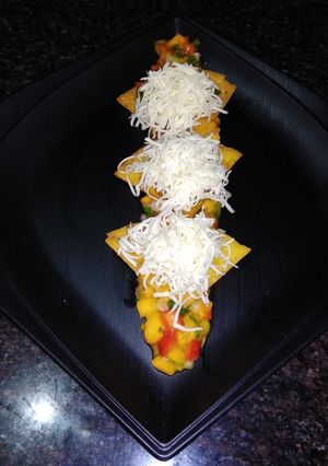 A picture of Raw Mango Nachos with Ripe Mango Salsa.