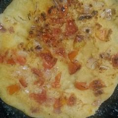 A picture of Tomato Uttapam.