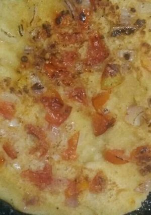 A picture of Tomato Uttapam.
