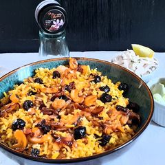 A picture of Nuts and berry pulao with brown rice.