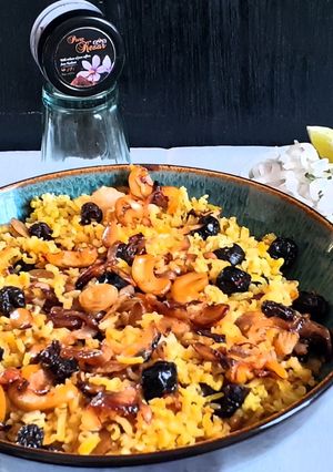 A picture of Nuts and berry pulao with brown rice.