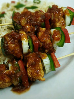A picture of Shashlik with sweet and sour sauce.