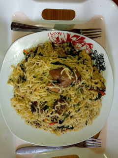 A picture of Noodles with Ugwu leaf.