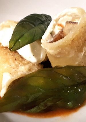 A picture of Baked Paccheri Stuffed with Eggplant on Tomato Sauce.