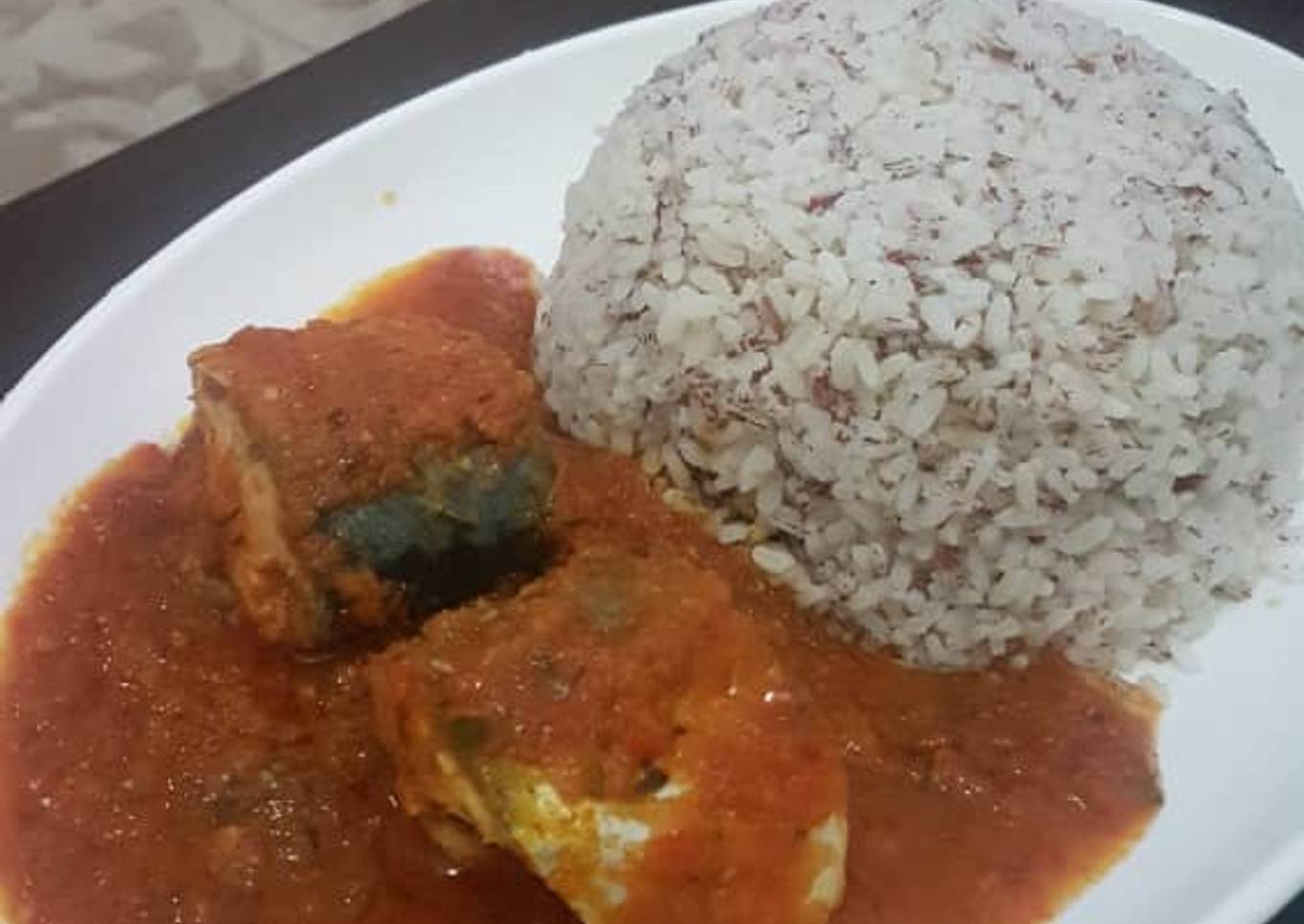 Titus fish stew and ofada rice