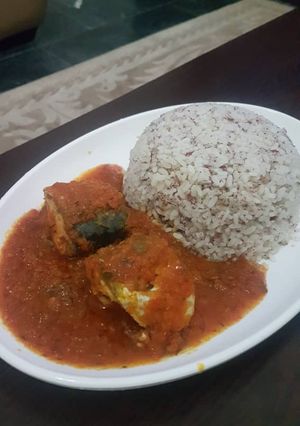 A picture of Titus fish stew and ofada rice.