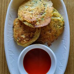 A picture of Red lentils mini uttapam.