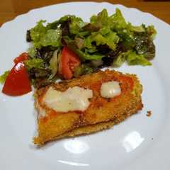 Una foto de Berenjena y zucchini rellenos