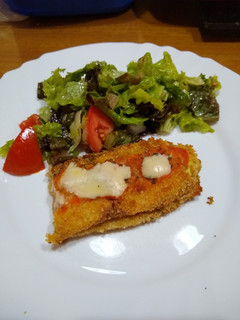 Una foto de Berenjena y zucchini rellenos