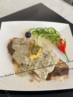 A picture of Pan-Roasted Greenland Halibut with Truffle Seasoning Sauces.