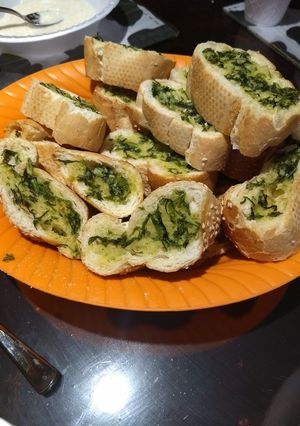 Una foto de Pan 🍞 de ajo con perejil