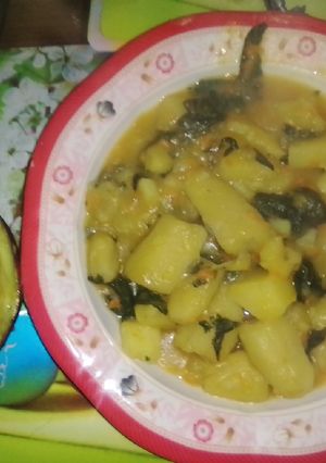A picture of Matoke and spinach.