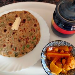Methi, spring onion and cheese paratha A picture of Methi, spring onion and cheese paratha.