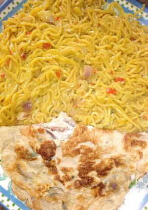 A picture of Indomie and fried egg.