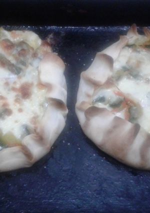 Una foto de "Canastitas de zapallitos con tapas de tarta"