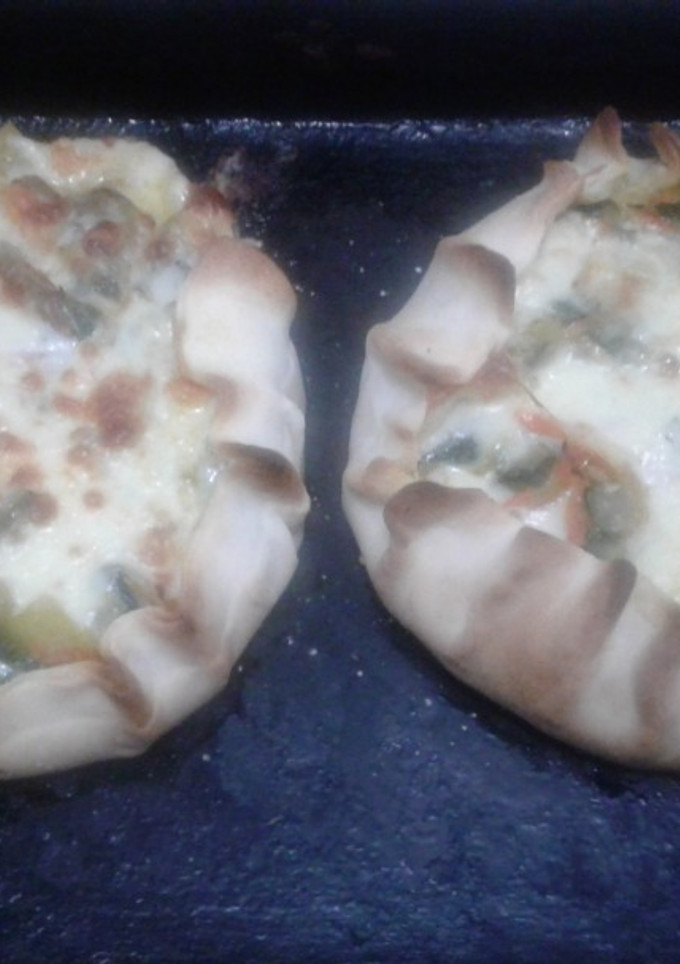 Una foto de "Canastitas de zapallitos con tapas de tarta"