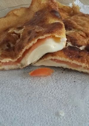 Una foto de Huevo con queso y tomate que rico 😉