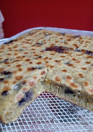 Una foto de Cuadrados de mandarina y arándanos saludables en flip essen