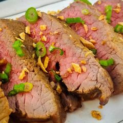 A picture of MARINATED RIB-EYE STEAK.