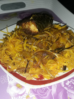 A picture of Abacha with fried fish.