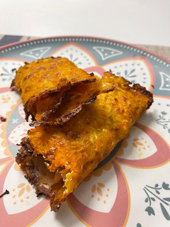 Una foto de Rollito de queso, patata y zanahoria