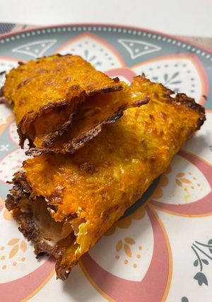 Una foto de Rollito de queso, patata y zanahoria