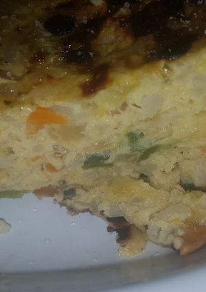 Una foto de Tortilla de zapallito junto con arroz zanahoria y de más