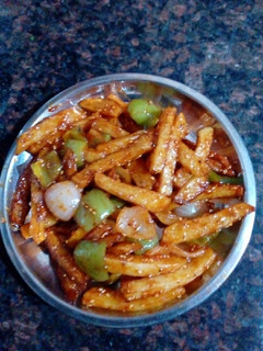 A picture of Chilli potato with piri piri sauce.